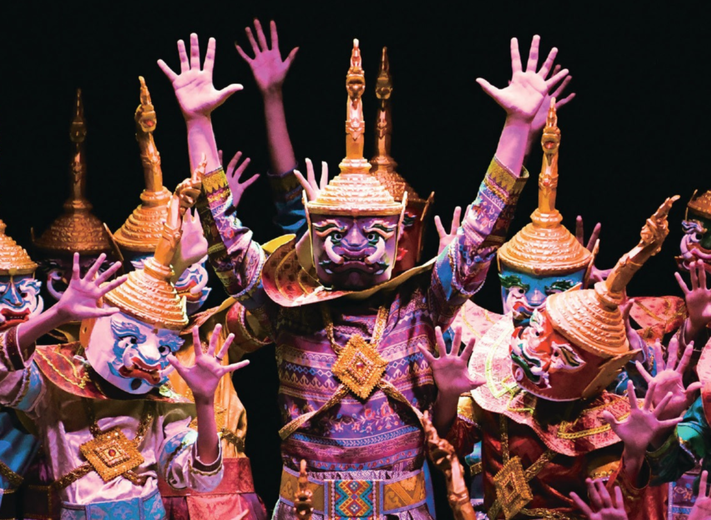 Costumed dancers performing Buddha’s Light
